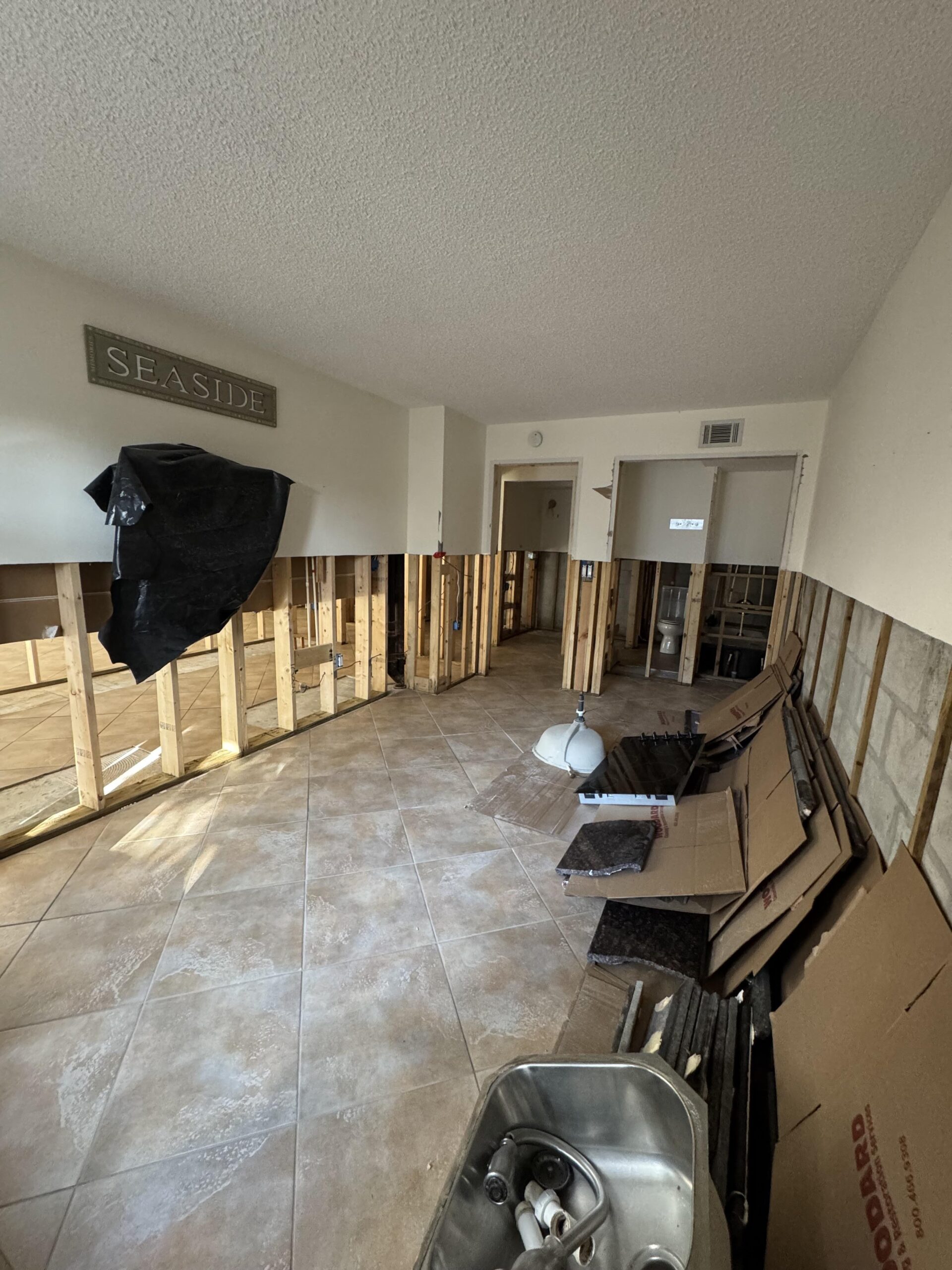 Hurricane water damage mitigation in a Longboat Key beachfront condo with perimeter flood cuts